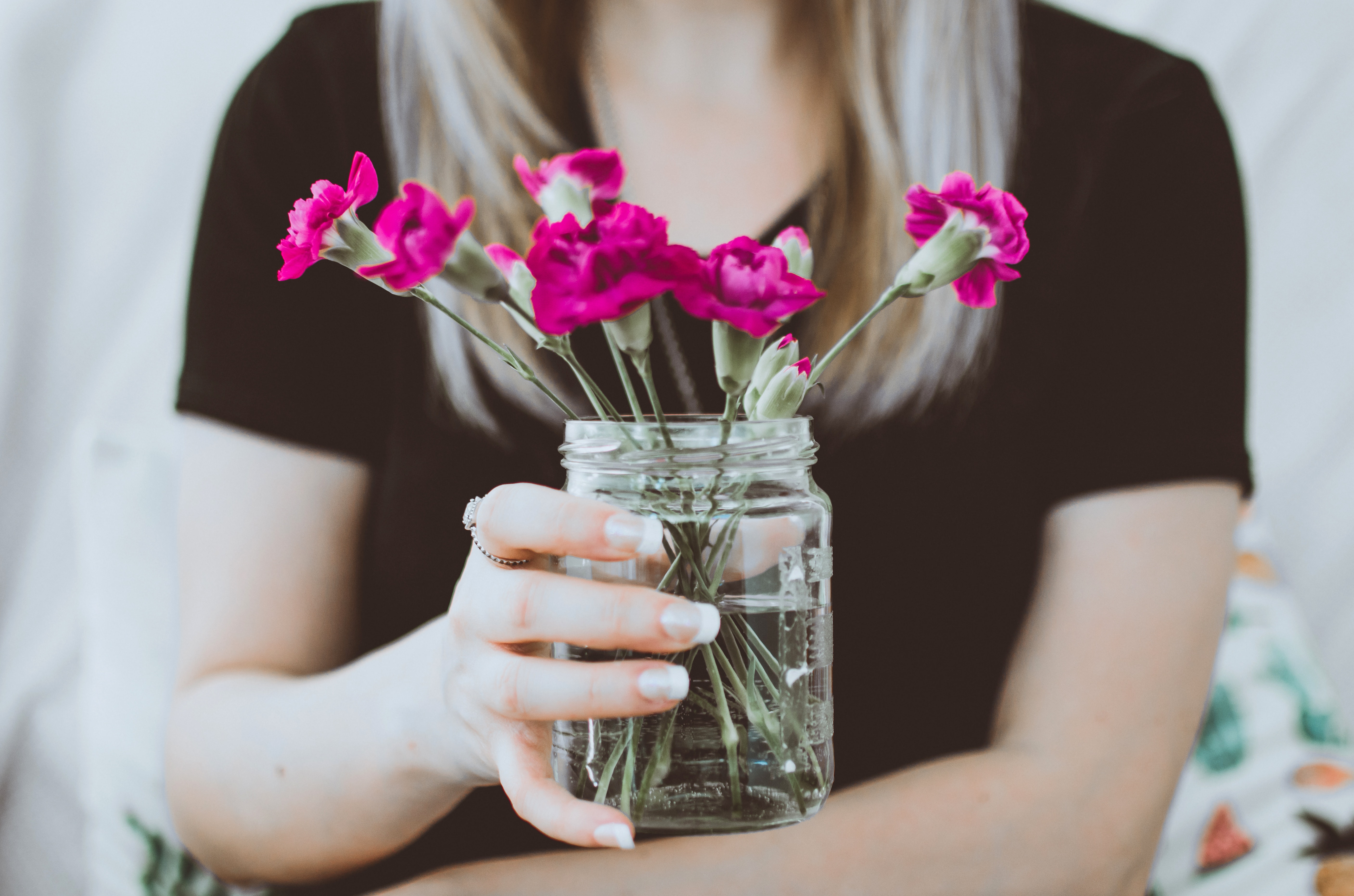 woman holding flowers